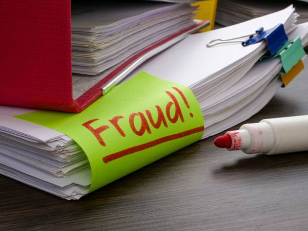 A file folder with a yellow label and a red marker
AI-generated content may be incorrect.